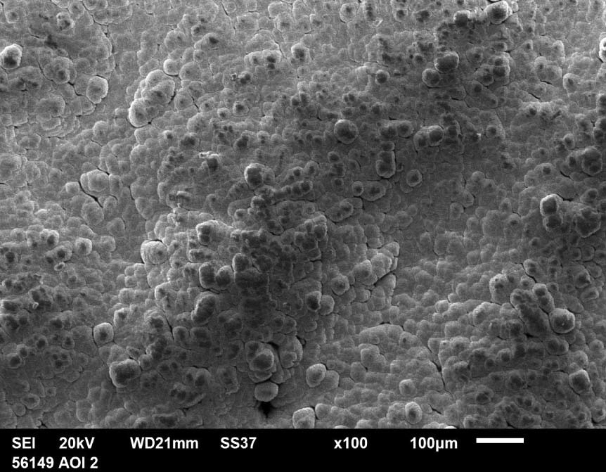 Рис. 10. Микрофотография поверхности  образца многослойного материала, полученного  методом СЭЛС с нанесенным на него покрытием